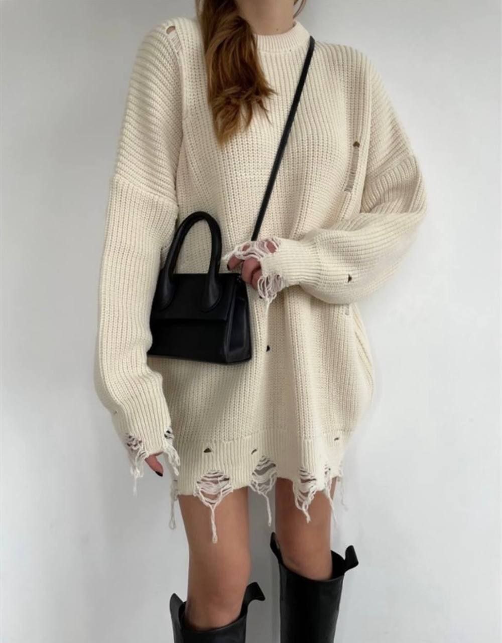 Maglione buchi